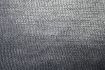 Black jeans torn denim texture.