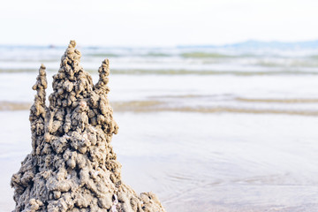 Sandcastle on a sandy beach