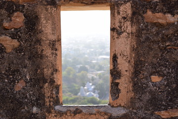 City view through heritage wall 