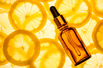 Citrus lemon essential oil, vitamin c serum, beauty care aroma therapy.