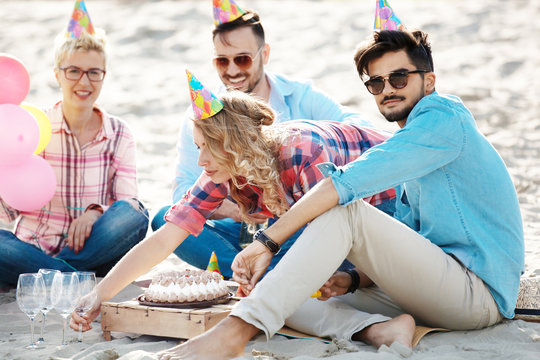 Group of Friends Having Fun on the Beach