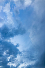 Beautiful clouds at sunset after rain as background .