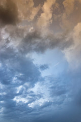 Obraz premium Beautiful clouds at sunset after rain as background .