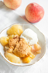 peach cobbler with ice cream