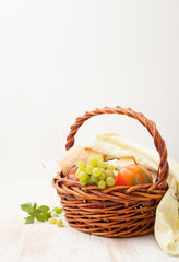 Fototapeta na wymiar Basket for a picnic on a white background