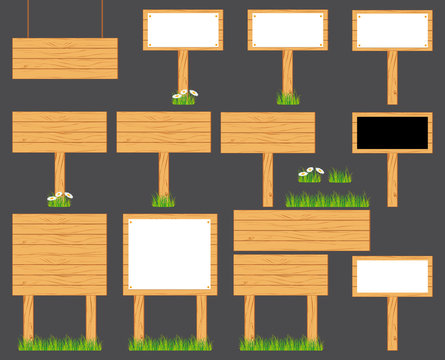 Wooden realistic display signboards standing on the grass or isolated. Vector collection on grey background.