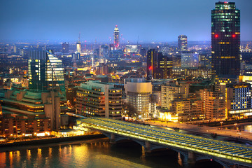 Fototapeta na wymiar London at night, view at River Thames embankment and London bridge with night lights reflection