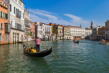 Fototapeta na wymiar Gondola in Grand Canal at Venice Italy