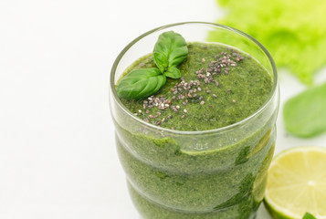 Green smoothie with ingredients