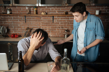 Kind male person suffering from alcoholism