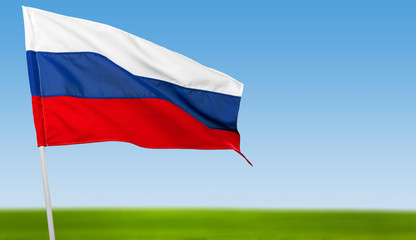 Russian flag against blue sky