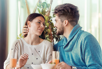 Romantic couple having rest in cafe