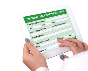 Incident or accident report form on tablet computer.