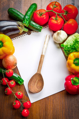 blank recipe book and food ingredients