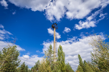 Obraz premium Old railroad light tower in Pripyat ghost town of Chernobyl Exclusion Zone, Ukraine