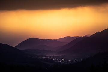 A beautiful sunset landscape of Tatra mountains in Slovakia. Colorful look in purple tones.