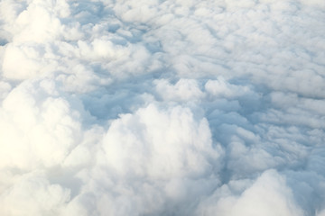 White soft cloud and sky from airplane window