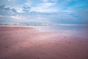 Eastbourne  , East Sussex, England. Eastbourne beach at the low tide on sunset