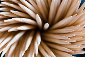 Top view of beautifully laid wooden toothpicks.