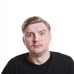 Obraz premium Surprised man expressing amaze on face