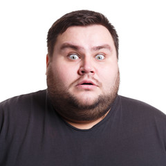 Obraz premium Shocking news. Wonder man expressing amaze on face