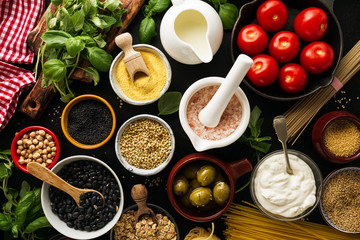 Food background Food Concept with Various Tasty Fresh Ingredients for Cooking. Italian Food Ingredients. View from Above.