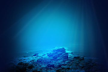 Fototapeta na wymiar Deep blue sea background with sunlight shining 