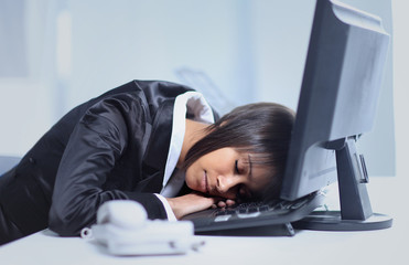 businesswoman sleeping in her office