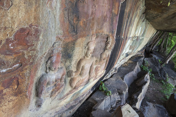 Buddha carved on stone