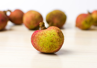 Lychee tropical fruit on wooden table