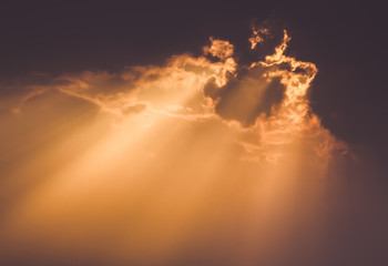 Beautiful sunset with clouds, light rays and atmospheric effect
