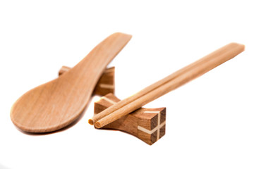 Wooden chopsticks on white backgrounds