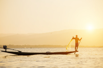 Fisherman of Lake in action when fishing