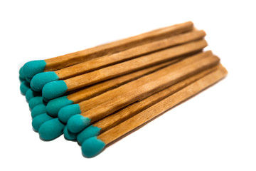 Close-up of a blue match on white backgrounds