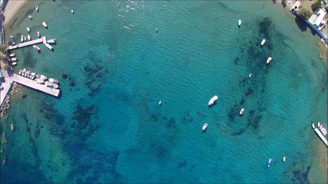 Flight over the port of Pollonia on the Island of Milos in Greece. Part 1 of 2. 