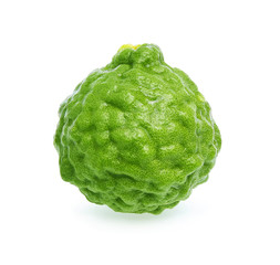One Whole Bergamot fruit with water drop isolated on white background.