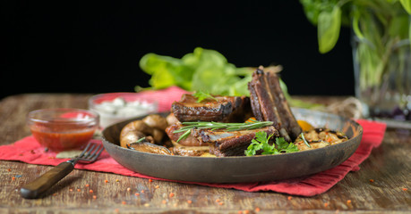 Appetizing Pork ribs (panoramic format)