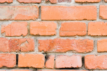 Brick orange background close-up
