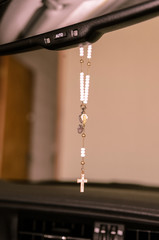  Rosary on car mirror