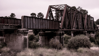 Old rusty weathered railway bridge