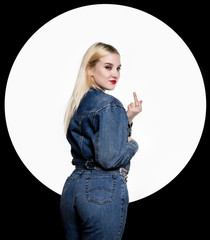 Criminal young woman shows aggression and middle finger