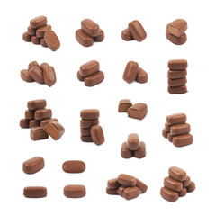 Chocolate coated toffee candy isolated
