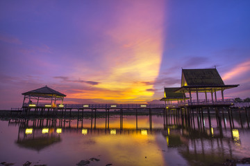 Fototapeta premium Wooden bridge in the sunset