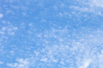 Fototapeta na wymiar White clouds on a blue sky. Selective focus