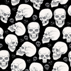 Obraz na płótnie Canvas Seamless pattern with skulls on black blackground