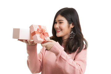 Young Asian woman open a gift box.