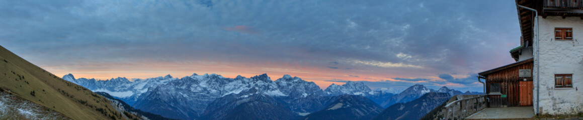 Burning sunrise over mountains panorama