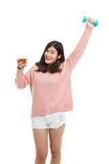 Healthy Asian woman with dumbbell and  tomato juice.