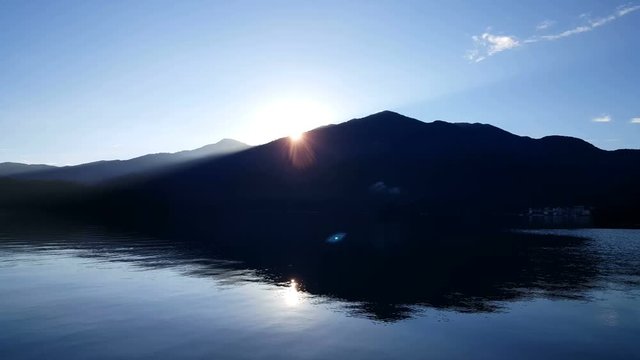 Runrise behind the mountains near the Sun Moon Lake
