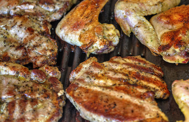 Baking fresh meat on grill closeup